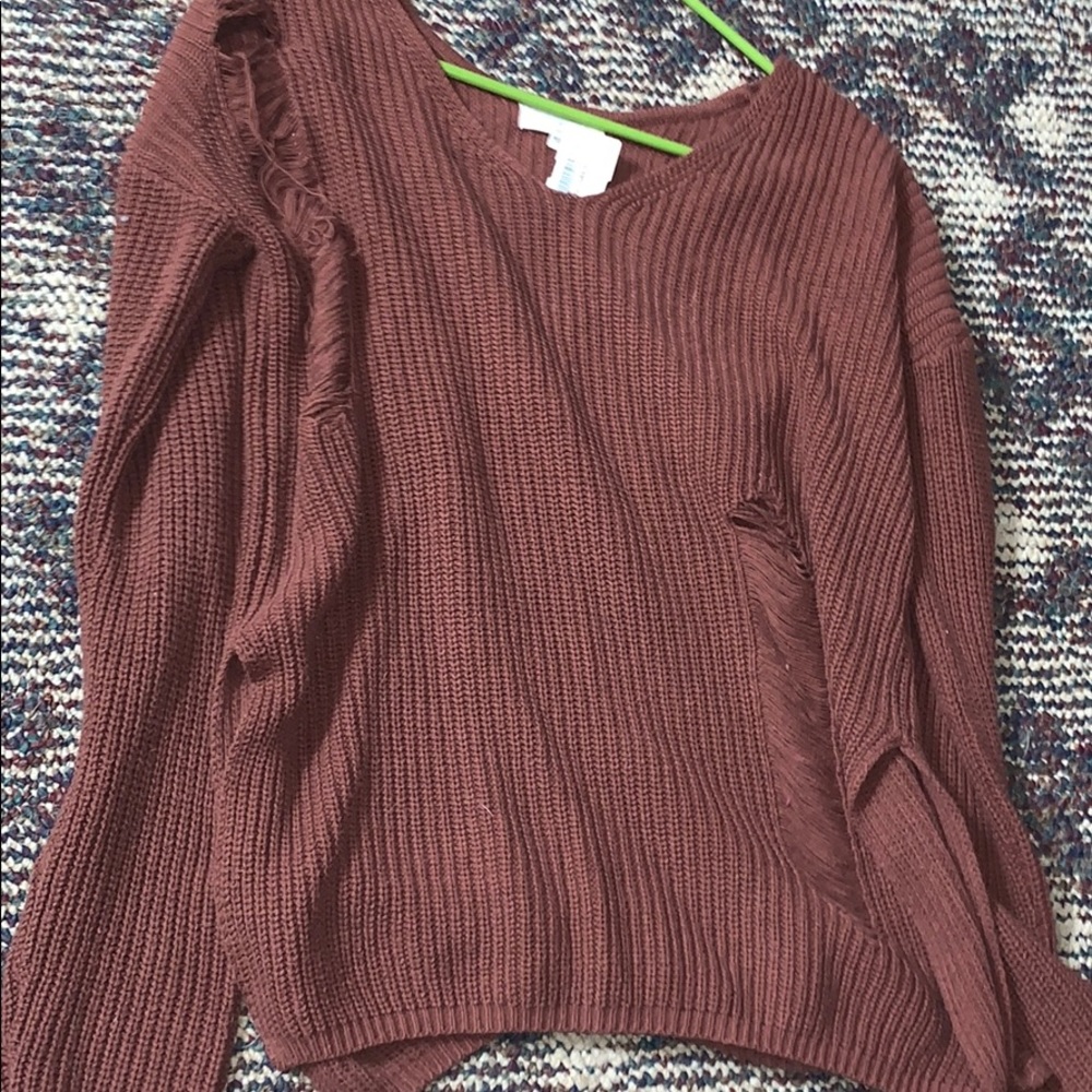 Ripped v neck sweater